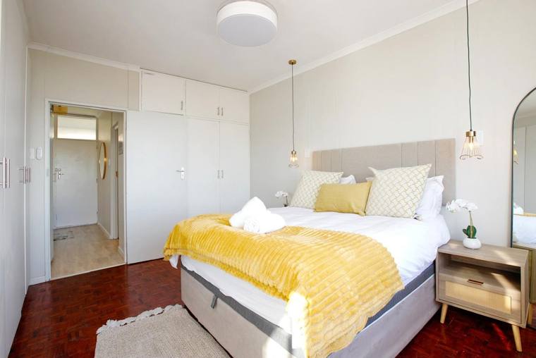Bedroom with built-in cupboards